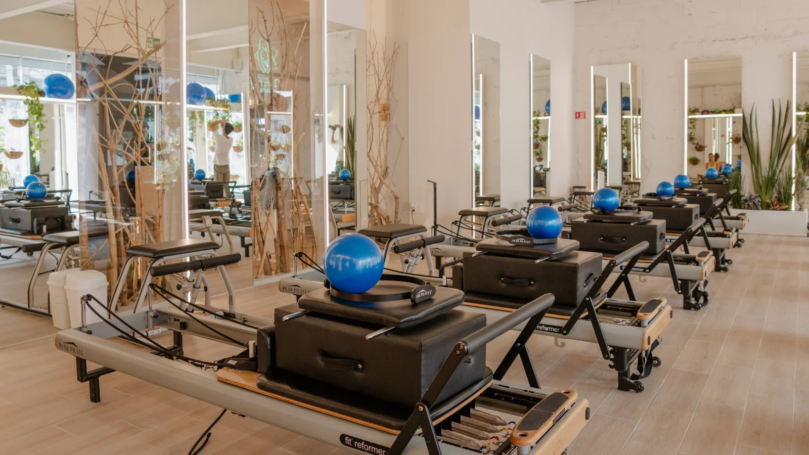 Clase de Pilates Reformer en estudio The Fit Pilates